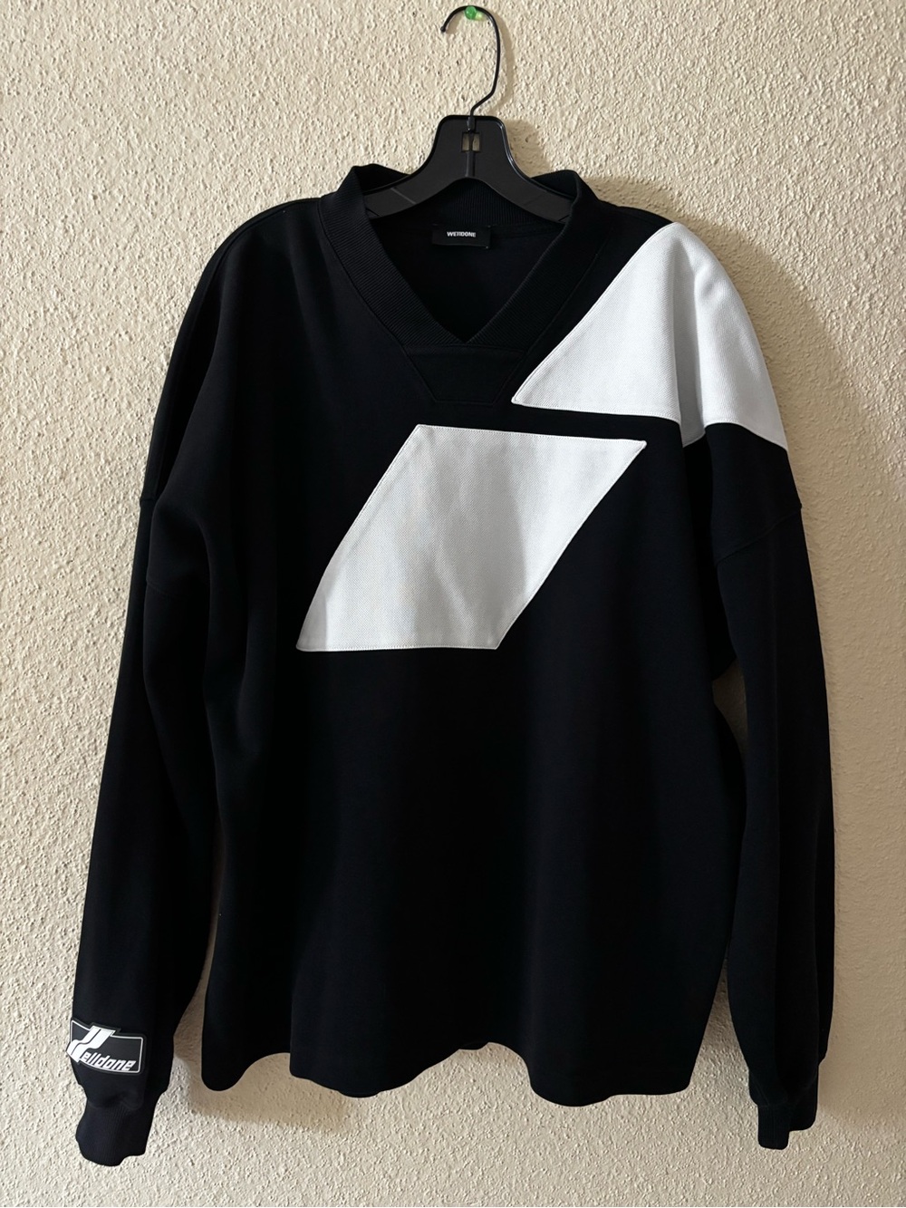Men's Black V-Neck Sweater with White Geometric Accents - Picture 1 of 7